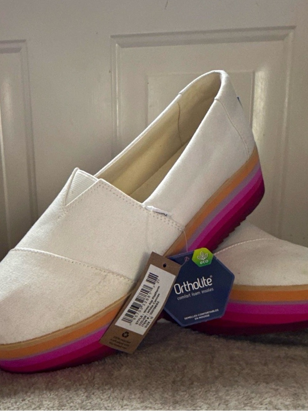 White Platform Slip-On TOMS Canvas Shoe with Rainbow Stripe Sole
